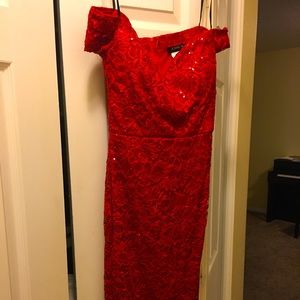 Red, lacy and sparkly, knee-length, semi-formal dress.